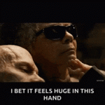 touching-chin-baby-hand.gif